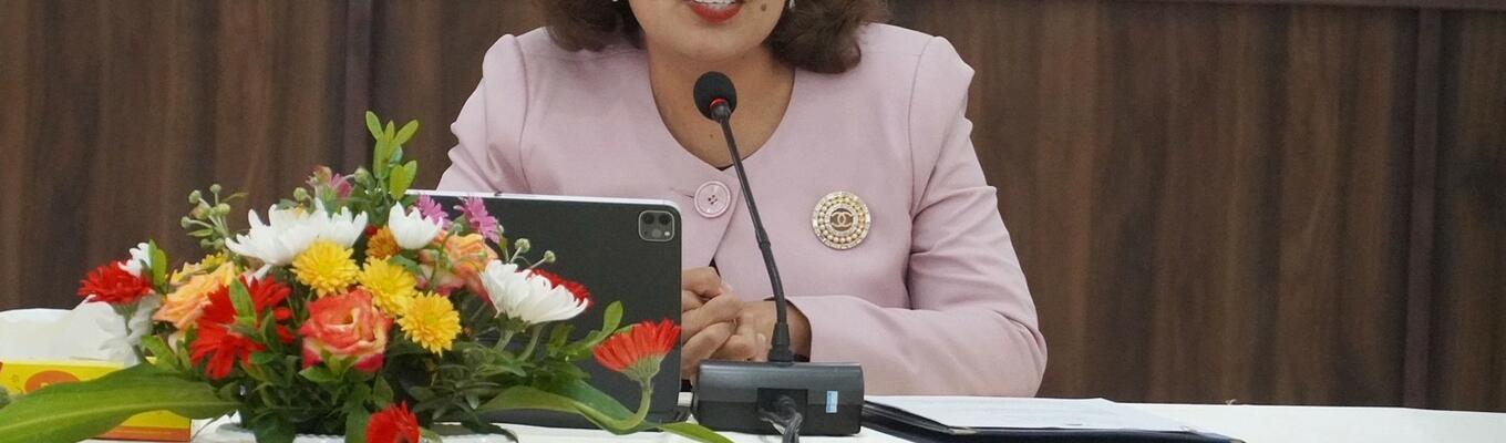 Vice-Minister for ASEAN Affairs of Timor-Leste, Milena Rangel, speaks from table with flowers