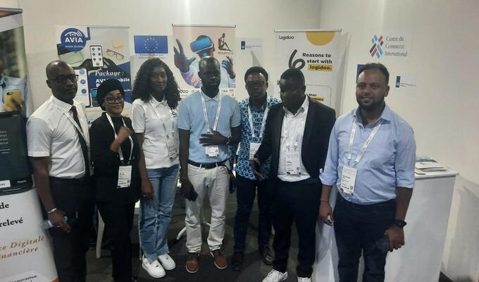 African entrepreneurs at conference booth