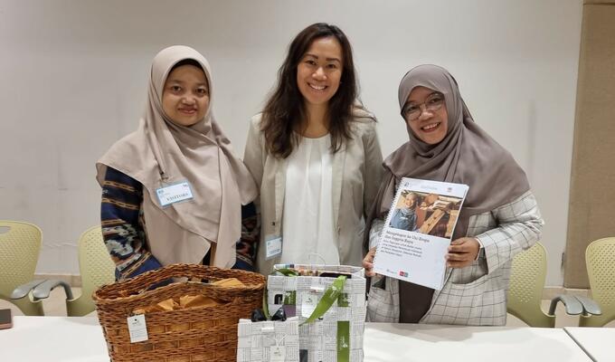Three Indonesian woman showcase new handbook and homeware products