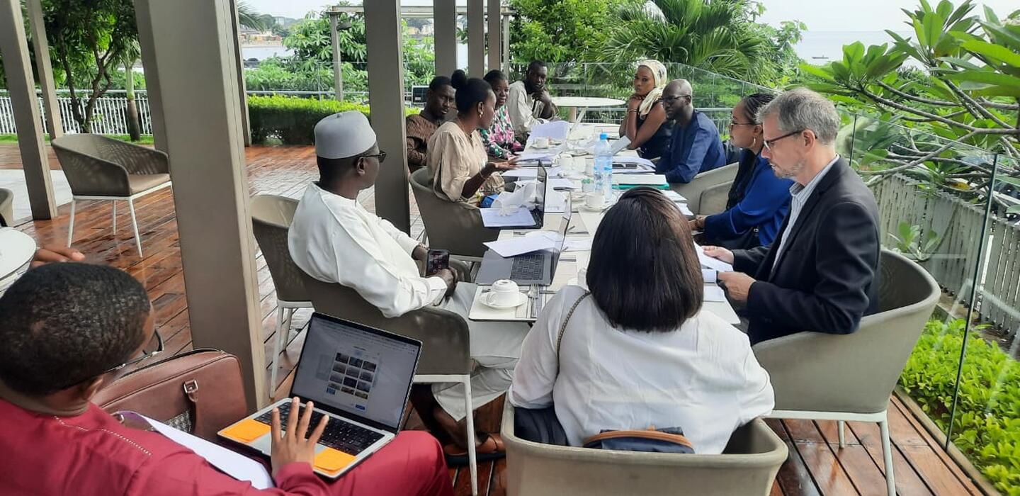 Senegalese tech startups meet with NTFV staff around a table