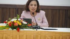 Vice-Minister for ASEAN Affairs of Timor-Leste, Milena Rangel, speaks from table with flowers