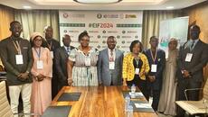 West African business leaders meet in conference room